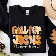 Load image into Gallery viewer, Black sweatshirt with &#39;Fall for Jesus he never leaves&#39; text and pumpkin design on a white background.