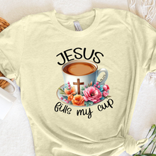 Load image into Gallery viewer, Light yellow t-shirt with 'Jesus fills my cup' design featuring a tea cup, cross, and flowers.