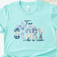 Load image into Gallery viewer, Ice blue t-shirt with 'True Story he is Risen faux patchwork design