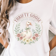 Load image into Gallery viewer, White t-shirt with 'Thrifty Goose Social Club' design featuring a goose and floral elements.