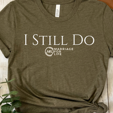 Load image into Gallery viewer, Green t-shirt with 'I STILL DO' text 
