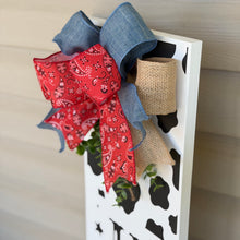 Load image into Gallery viewer, Red bandana bows and greenery.