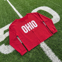 Load image into Gallery viewer, Red open-front Ohio sweatshirt cardigan with distressed white OHIO lettering and cuffed long sleeves, displayed on a hanger.