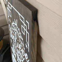 Load image into Gallery viewer, Wooden sign with white text &#39;Believe in the magic of Christmas&#39; on a dark walnut background