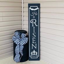 Load image into Gallery viewer, Decorative porch leaner sign with 'He is Risen' text on a black board with white lettering