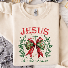 Load image into Gallery viewer, Jesus Is The Reason For The Season With Bow Cream Colored Crew Neck Sweatshirt