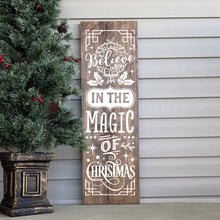 Load image into Gallery viewer, Wooden Christmas sign with decorative text Believe in the Magic of Christmas.