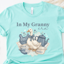 Load image into Gallery viewer, In My Granny Era Ice Blue Bella Canvas t shirt with white goose