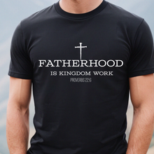 Load image into Gallery viewer, Black Bella Canvas T Shirt With Fatherhood Is Kingdom Work a Cross and Proverbs 22:6